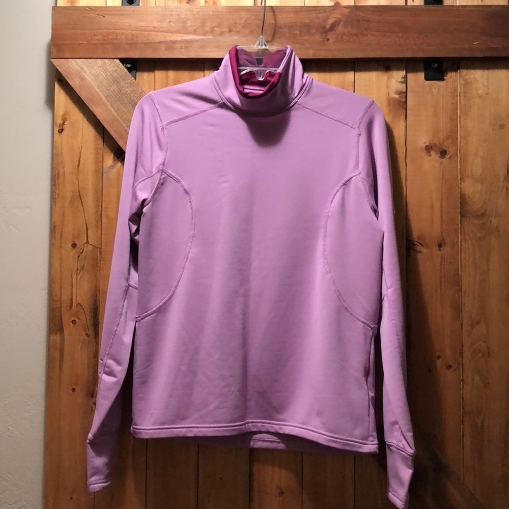 Ladies Nike DRI-FIT long sleeve workout shirt.